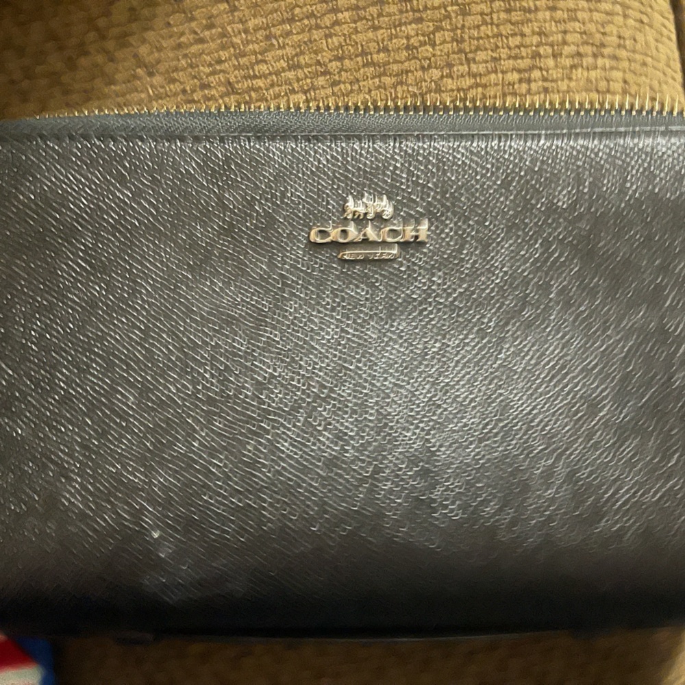 Large coach wallet black with pewter coach logo.